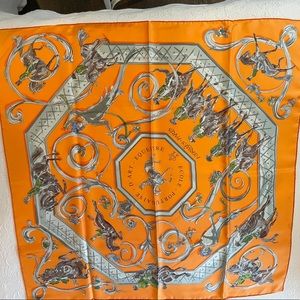 Lovely Hermes scarf in traditional Hermes orange. Absolutely stunning!!